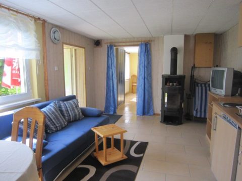 Wohnzimmer des Gartenhauses der Apartmentvermietung